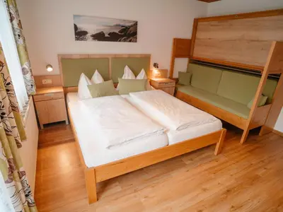 Ein Bett oder Betten in einem Zimmer der Unterkunft Apartment Furrach by Interhome