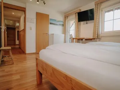 Ein Bett oder Betten in einem Zimmer der Unterkunft Apartment Grimming by Interhome