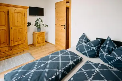 Ein Bett oder Betten in einem Zimmer der Unterkunft Rainerhof Troadkasten
