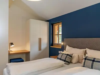 Ein Bett oder Betten in einem Zimmer der Unterkunft Villa Gradenbach