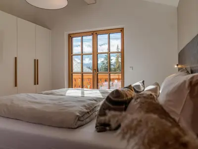 Ein Bett oder Betten in einem Zimmer der Unterkunft Villa Gradenbach