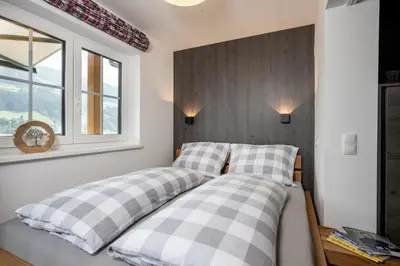 Ein Bett oder Betten in einem Zimmer der Unterkunft Planai Home - Schladming
