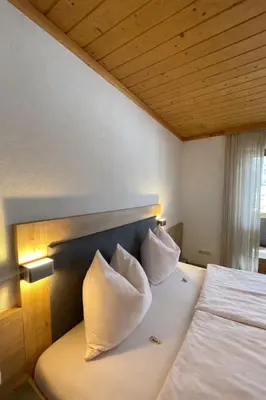 Ein Bett oder Betten in einem Zimmer der Unterkunft Ferienwohnung für alle Sportbegeisterten