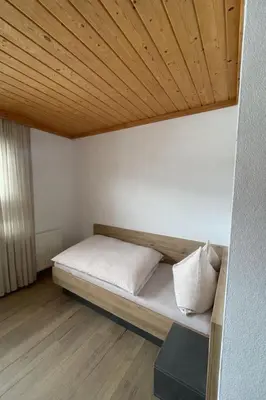 Ein Bett oder Betten in einem Zimmer der Unterkunft Ferienwohnung für alle Sportbegeisterten
