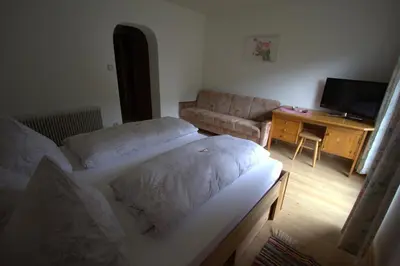 Ein Bett oder Betten in einem Zimmer der Unterkunft Hausmenneweger