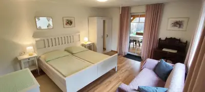 Ein Bett oder Betten in einem Zimmer der Unterkunft Ferienwohnung Elisabeth Laimer