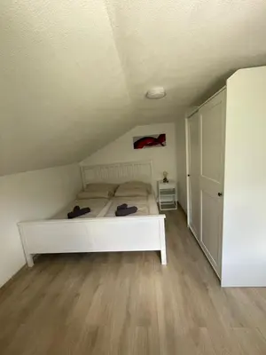Ein Bett oder Betten in einem Zimmer der Unterkunft Dark Sky TWO