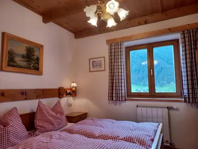 Ein Bett oder Betten in einem Zimmer der Unterkunft Ferienwohnungen Asterbach