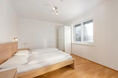 Ein Bett oder Betten in einem Zimmer der Unterkunft Appartements Ramsau am Dachstein by Schladmingurlaub