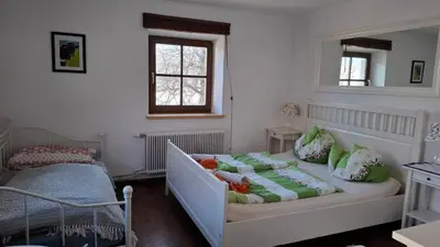 Ein Bett oder Betten in einem Zimmer der Unterkunft Meissnitzerhof