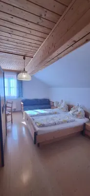 Ein Bett oder Betten in einem Zimmer der Unterkunft Ferienwohnung Hentschel in Tauplitz