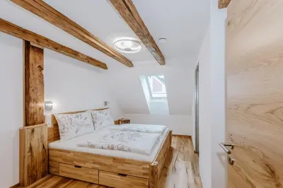 Ein Bett oder Betten in einem Zimmer der Unterkunft Apartments Altstadtflair
