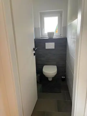 Ein Badezimmer in der Unterkunft Ferienwohnung Langfeld