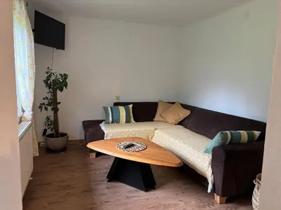 Ein Sitzbereich in der Unterkunft Ferienwohnung Langfeld