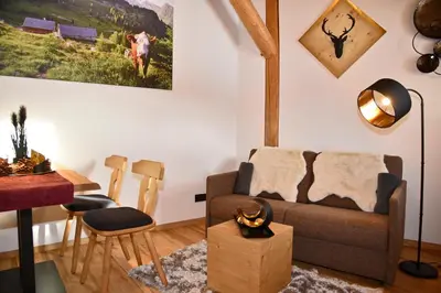 Ein Sitzbereich in der Unterkunft Bockspitze Deluxe Appartements