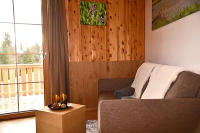 Ein Sitzbereich in der Unterkunft Bockspitze Deluxe Appartements