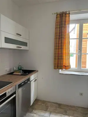 Küche/Küchenzeile in der Unterkunft Charmante Wohnung in Gmunden, 1min zum See
