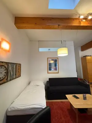 Ein Bett oder Betten in einem Zimmer der Unterkunft Wohnung im Zentrum von Schladming