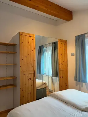 Ein Bett oder Betten in einem Zimmer der Unterkunft Wohnung im Zentrum von Schladming