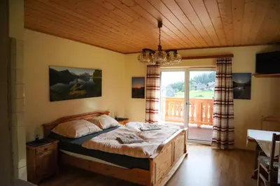 Ein Bett oder Betten in einem Zimmer der Unterkunft Ferienwohnung Trisselwand