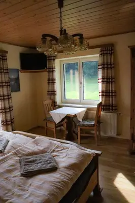 Ein Bett oder Betten in einem Zimmer der Unterkunft Ferienwohnung Trisselwand