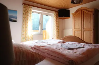 Ein Bett oder Betten in einem Zimmer der Unterkunft Ferienwohnung Trisselwand