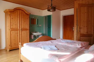 Ein Bett oder Betten in einem Zimmer der Unterkunft Ferienwohnung Trisselwand