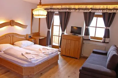 Ein Bett oder Betten in einem Zimmer der Unterkunft AmadéLodge