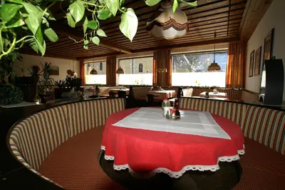 Ein Restaurant oder anderes Speiselokal in der Unterkunft Gasthof zur Post