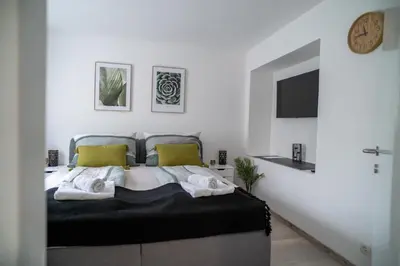 Ein Bett oder Betten in einem Zimmer der Unterkunft FarawayHomes Studio St Wolfgang #2