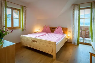 Ein Bett oder Betten in einem Zimmer der Unterkunft Haus Hödlmoser