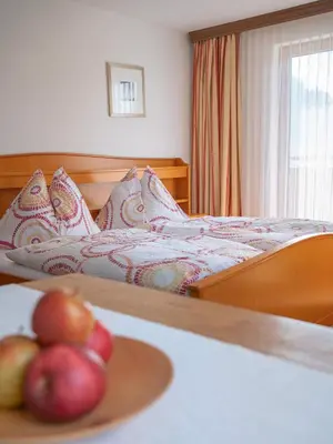 Ein Bett oder Betten in einem Zimmer der Unterkunft Ferienhaus Dachsteinheim