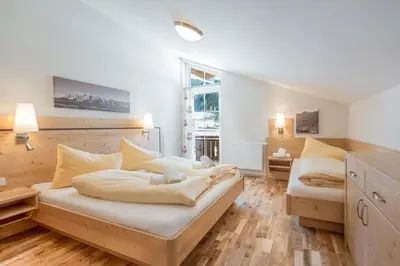 Ein Bett oder Betten in einem Zimmer der Unterkunft Appartements Bergheimat