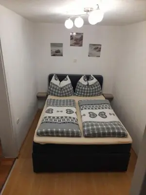 Ein Bett oder Betten in einem Zimmer der Unterkunft Holiday Home Doris