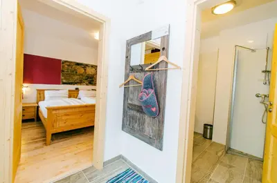 Ein Bett oder Betten in einem Zimmer der Unterkunft David Appartments