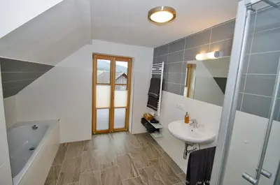 Ein Badezimmer in der Unterkunft David Appartments