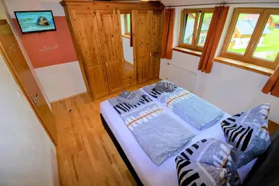 Ein Bett oder Betten in einem Zimmer der Unterkunft David Appartments