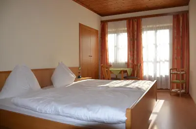 Ein Bett oder Betten in einem Zimmer der Unterkunft Urlaub am Kräutlhof in Mariapfarr