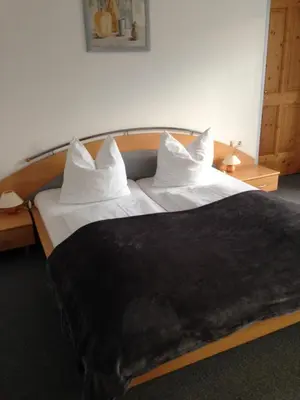 Ein Bett oder Betten in einem Zimmer der Unterkunft Haus Obermoser