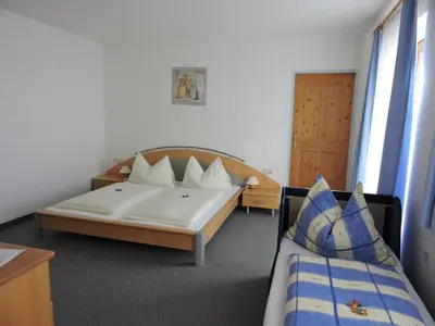 Ein Bett oder Betten in einem Zimmer der Unterkunft Haus Obermoser