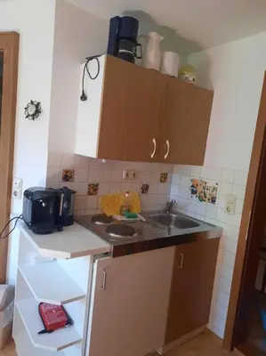 Küche/Küchenzeile in der Unterkunft Ferienwohnung direkt am See 4