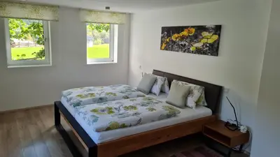 Ein Bett oder Betten in einem Zimmer der Unterkunft Ferienwohnung Stegmühle II