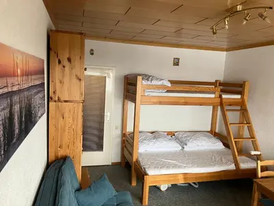 Ein Bett oder Betten in einem Zimmer der Unterkunft Slunný apartmán v Sonnenalm - Bad Mitterndorf