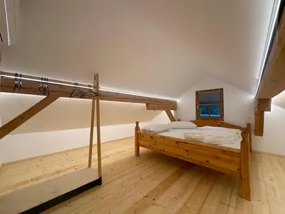 Ein Bett oder Betten in einem Zimmer der Unterkunft Seppenbauernhütte in Bad Ischl im Salzkammergut