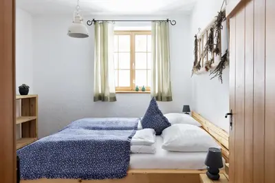 Ein Bett oder Betten in einem Zimmer der Unterkunft Sloho Bergurlaub