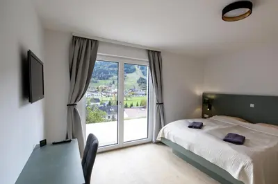 Ein Bett oder Betten in einem Zimmer der Unterkunft Panorama Apartment