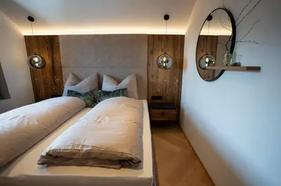 Ein Bett oder Betten in einem Zimmer der Unterkunft Oberkatschberg 75