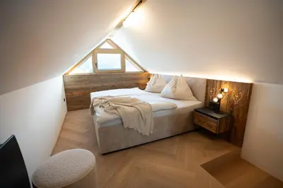 Ein Bett oder Betten in einem Zimmer der Unterkunft Oberkatschberg 75