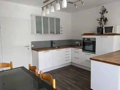 Küche/Küchenzeile in der Unterkunft Schöne Wohnung mit Terrasse, Garten und-Pool