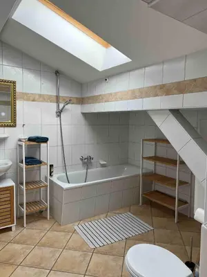 Ein Badezimmer in der Unterkunft Tauglerei Appartement Hagebutte